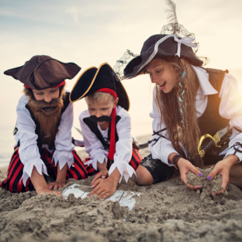 Pirates and families celebrating at Tybee Island Pirate Fest