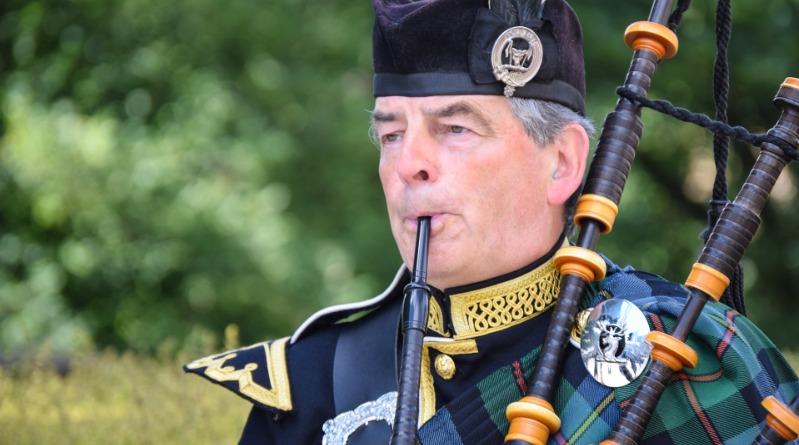 Man Playing Bagpipes