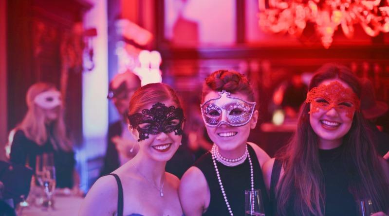 Group In Mardi-gras Masks