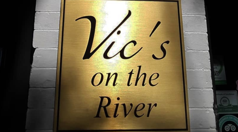 Vics On The River Sign