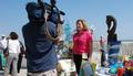 News Reporter on Tybee Island Beach 